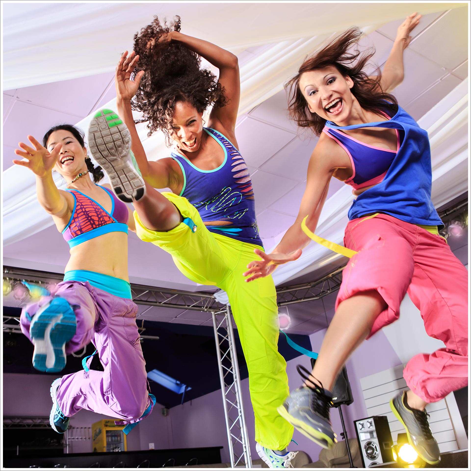 a group of women jumping in the air